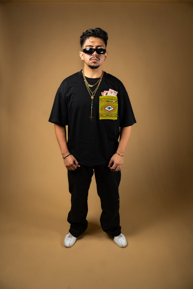 Oaxaca woven pocket, Indigenous handmade streetwear, Mexican artisan clothing, naturally dyed wool, one of one t-shirt, Seattle streetwear brand, artisanal fashion, handwoven textile apparel, marigold dye, cochineal dye, indigo dye, sheep wool pocket tee.