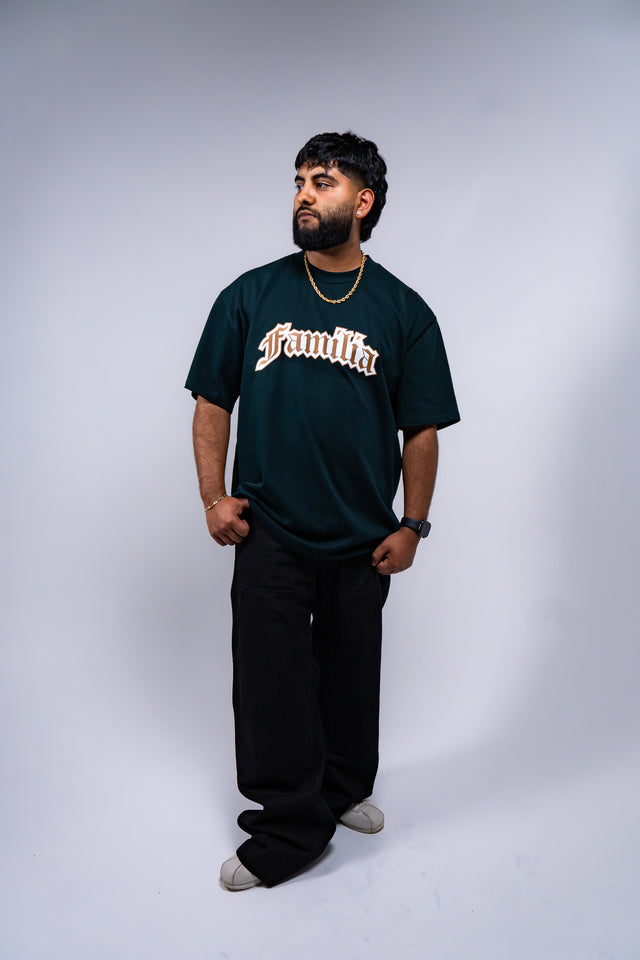 Familia graphic tee, Familia shirt, Mediums Collective tee, Latino streetwear, Mexican inspired clothing, family pride shirt, Gothic graphic tee, men’s streetwear shirt, Seattle streetwear brand, cultural streetwear, heritage graphic tee, pine green graphic tee, black Familia shirt, cream graphic tee, Latino fashion brand, Mexican American streetwear, family shirt, everyday graphic tee, men’s casual fashion.