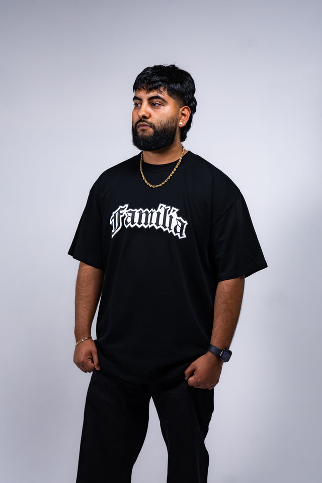 Familia graphic tee, Familia shirt, Mediums Collective tee, Latino streetwear, Mexican inspired clothing, family pride shirt, Gothic graphic tee, men’s streetwear shirt, Seattle streetwear brand, cultural streetwear, heritage graphic tee, pine green graphic tee, black Familia shirt, cream graphic tee, Latino fashion brand, Mexican American streetwear, family shirt, everyday graphic tee, men’s casual fashion.