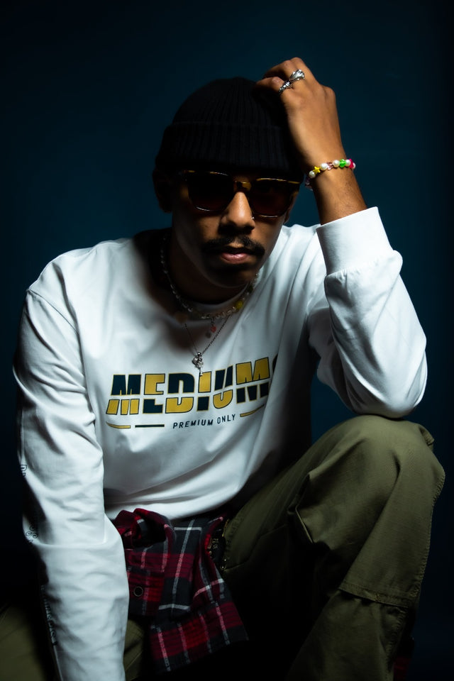 Chequered Mediums Logo - White