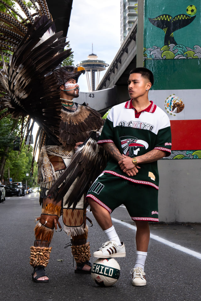 Mexico jersey set, Raza jersey, Mexican streetwear, Mediums Collective, Latino streetwear, Mexico soccer jersey, fútbol fashion, Mexico outfit, World Cup Mexico outfit, Mexican inspired clothing, green white red jersey, matching jersey shorts set, men’s streetwear set, Latino fashion brand, Seattle streetwear, cultural streetwear, Mexican heritage apparel, Raza clothing, Mexico number 10 jersey, eagle graphic jersey, fútbol streetwear, festival outfit, match day outfit.