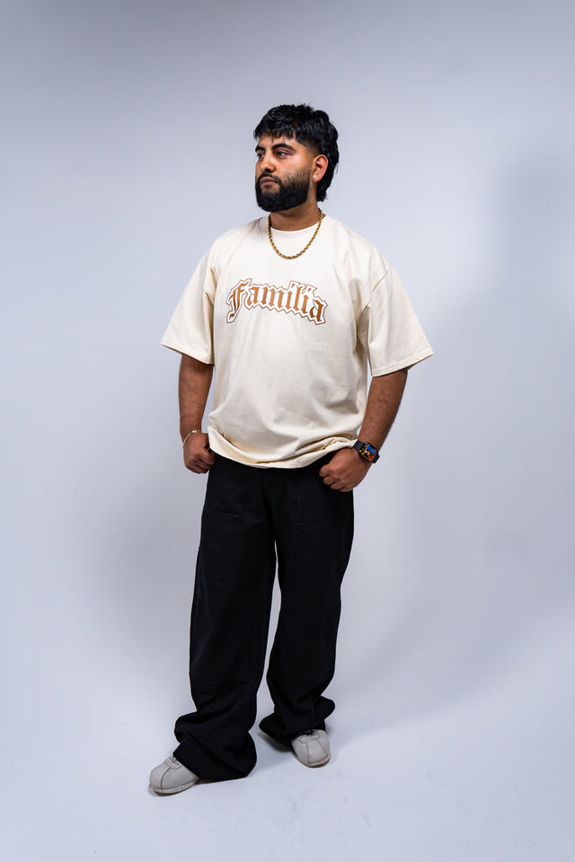 Familia graphic tee, Familia shirt, Mediums Collective tee, Latino streetwear, Mexican inspired clothing, family pride shirt, Gothic graphic tee, men’s streetwear shirt, Seattle streetwear brand, cultural streetwear, heritage graphic tee, pine green graphic tee, black Familia shirt, cream graphic tee, Latino fashion brand, Mexican American streetwear, family shirt, everyday graphic tee, men’s casual fashion.