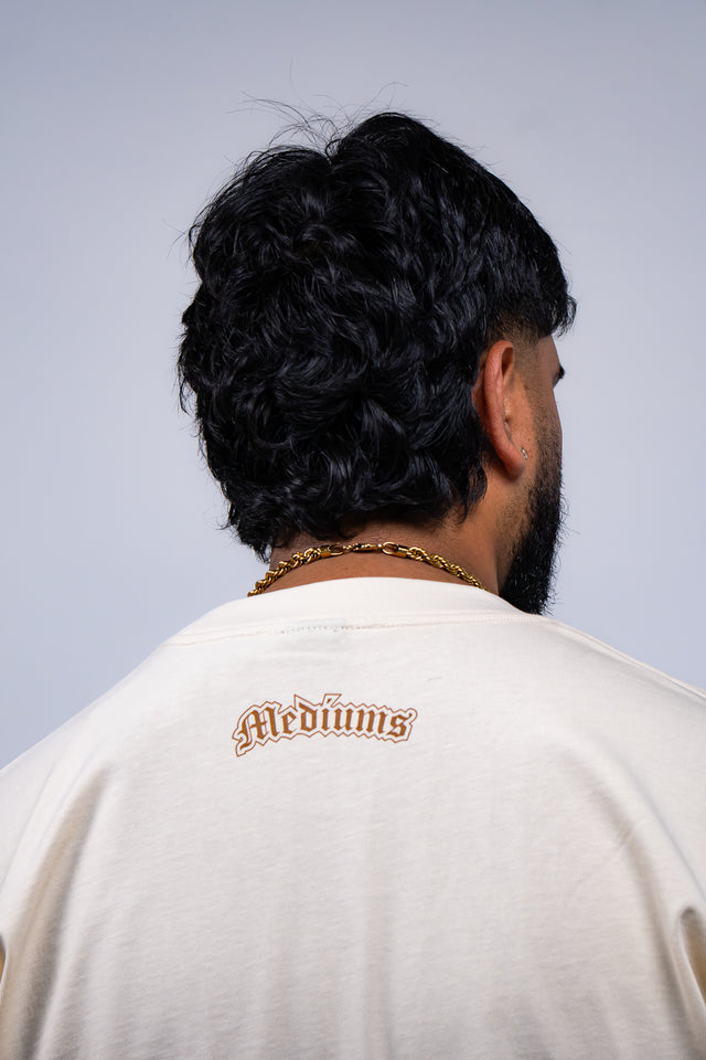 Familia graphic tee, Familia shirt, Mediums Collective tee, Latino streetwear, Mexican inspired clothing, family pride shirt, Gothic graphic tee, men’s streetwear shirt, Seattle streetwear brand, cultural streetwear, heritage graphic tee, pine green graphic tee, black Familia shirt, cream graphic tee, Latino fashion brand, Mexican American streetwear, family shirt, everyday graphic tee, men’s casual fashion.