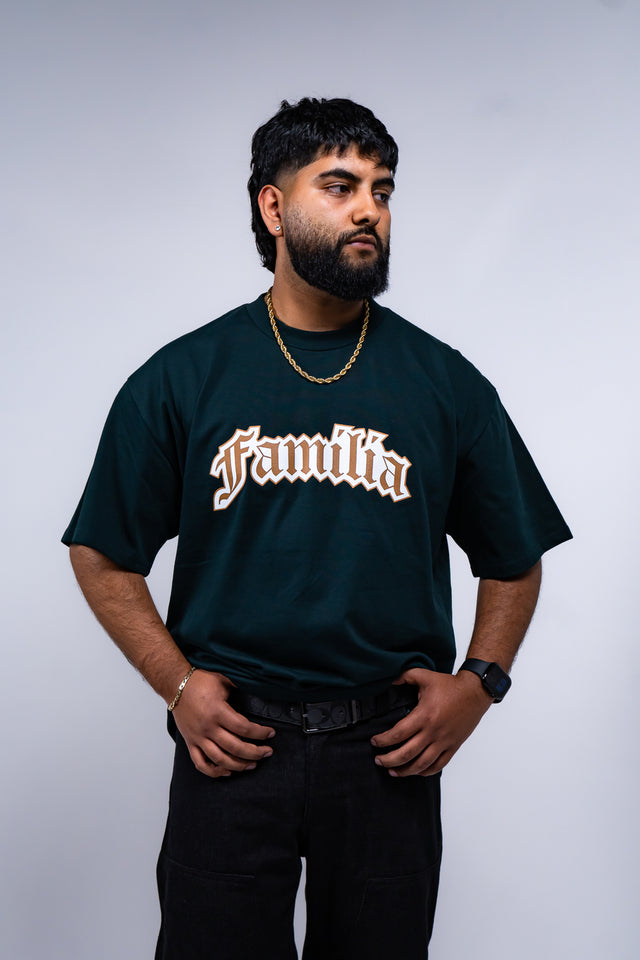 Familia graphic tee, Familia shirt, Mediums Collective tee, Latino streetwear, Mexican inspired clothing, family pride shirt, Gothic graphic tee, men’s streetwear shirt, Seattle streetwear brand, cultural streetwear, heritage graphic tee, pine green graphic tee, black Familia shirt, cream graphic tee, Latino fashion brand, Mexican American streetwear, family shirt, everyday graphic tee, men’s casual fashion.