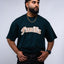 Familia graphic tee, Familia shirt, Mediums Collective tee, Latino streetwear, Mexican inspired clothing, family pride shirt, Gothic graphic tee, men’s streetwear shirt, Seattle streetwear brand, cultural streetwear, heritage graphic tee, pine green graphic tee, black Familia shirt, cream graphic tee, Latino fashion brand, Mexican American streetwear, family shirt, everyday graphic tee, men’s casual fashion.