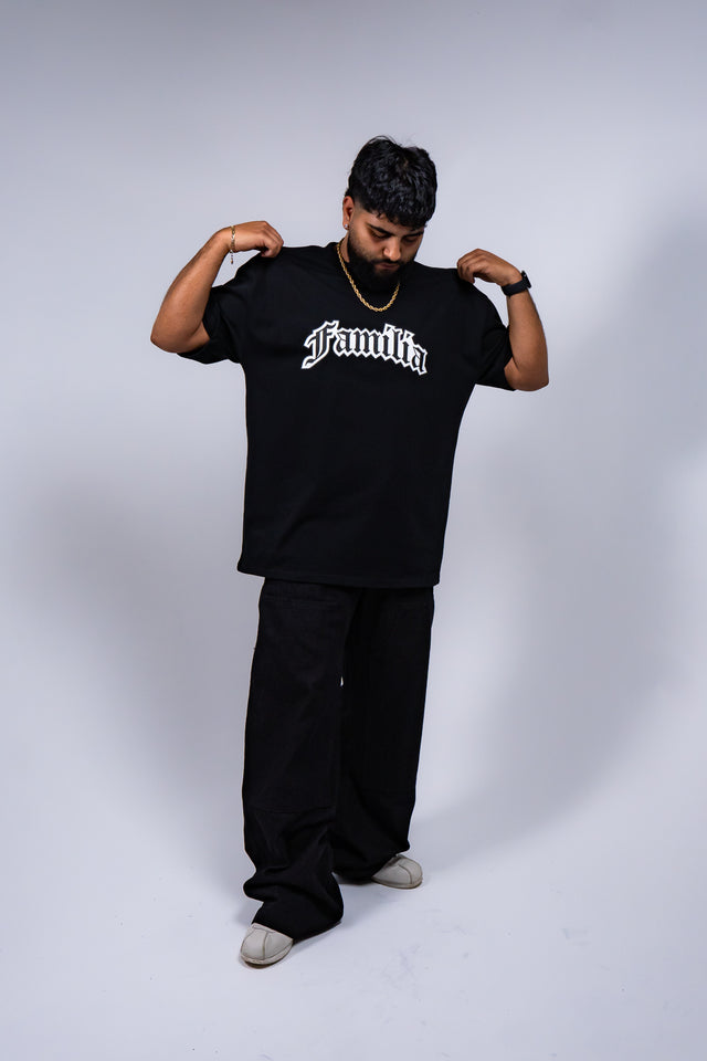 Familia graphic tee, Familia shirt, Mediums Collective tee, Latino streetwear, Mexican inspired clothing, family pride shirt, Gothic graphic tee, men’s streetwear shirt, Seattle streetwear brand, cultural streetwear, heritage graphic tee, pine green graphic tee, black Familia shirt, cream graphic tee, Latino fashion brand, Mexican American streetwear, family shirt, everyday graphic tee, men’s casual fashion.